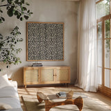 Kuba Play III Neutral by Cheryl Warrick. Shown in a natural wood frame in a cozy modern living room. Available as an archival giclee rolled canvas, fine art paper, or poster print. SKU 63180a.