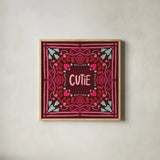 Love Sentiments Cutie by Cheryl Warrick. Shown in a natural wood glass frame for a timeless modern aesthetic. Available as an archival giclee rolled canvas, fine art paper, or poster print. SKU 104049a.