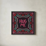 Love Sentiments Hug Me by Cheryl Warrick. Shown in a sleek black glass frame for a contemporary gallery look. Available as an archival giclee rolled canvas, fine art paper, or poster print. SKU 104047a.