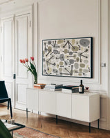 Mid Century I Achroma by Cheryl Warrick. shown as a framed stretched canvas in a living room above a console. Available as a archival giclee rolled canvas, fine art paper, or poster print. SKU 30004i.