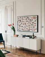 Mid Century I Blush by Cheryl Warrick. shown as a framed stretched canvas in a living room above a console. Available as a archival giclee rolled canvas, fine art paper, or poster print. SKU 42737i.