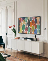 Orbs I Crop by Cheryl Warrick. shown as a framed stretched canvas in a living room above a console. Available as a archival giclee rolled canvas, fine art paper, or poster print. SKU 80041i.