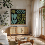 Plant Toss III by Cheryl Warrick. Shown in a natural wood frame in a cozy modern living room. Available as an archival giclee rolled canvas, fine art paper, or poster print. SKU 90947a.