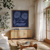Playful Petals IV by Cheryl Warrick. Shown in a natural wood frame in a cozy modern living room. Available as an archival giclee rolled canvas, fine art paper, or poster print. SKU 102947a.