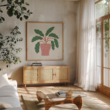 Potted Plants I by Cheryl Warrick. Shown in a natural wood frame in a cozy modern living room. Available as an archival giclee rolled canvas, fine art paper, or poster print. SKU 102638a.