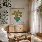 Potted Plants VIII by Cheryl Warrick. Shown in a natural wood frame in a cozy modern living room. Available as an archival giclee rolled canvas, fine art paper, or poster print. SKU 102645a.