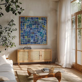 Sea Glass I by Cheryl Warrick. Shown in a natural wood frame in a cozy modern living room. Available as an archival giclee rolled canvas, fine art paper, or poster print. SKU 84791a.
