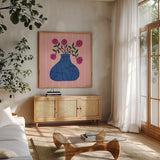Still Blooms I by Cheryl Warrick. Shown in a natural wood frame in a cozy modern living room. Available as an archival giclee rolled canvas, fine art paper, or poster print. SKU 103990a.