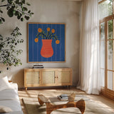 Still Blooms II by Cheryl Warrick. Shown in a natural wood frame in a cozy modern living room. Available as an archival giclee rolled canvas, fine art paper, or poster print. SKU 103991a.