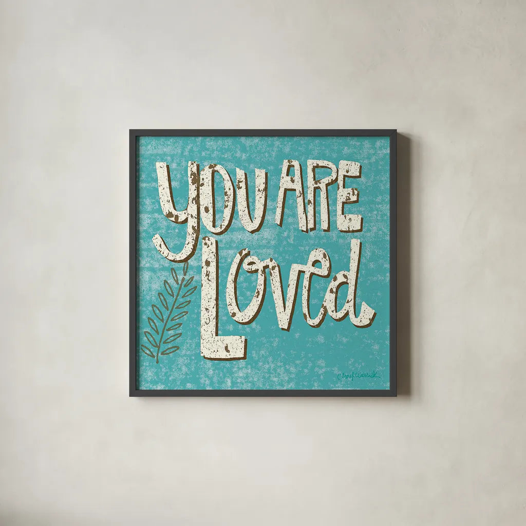 You are Loved by Cheryl Warrick. Shown in a sleek black glass frame for a contemporary gallery look. Available as an archival giclee rolled canvas, fine art paper, or poster print. SKU 18516a.