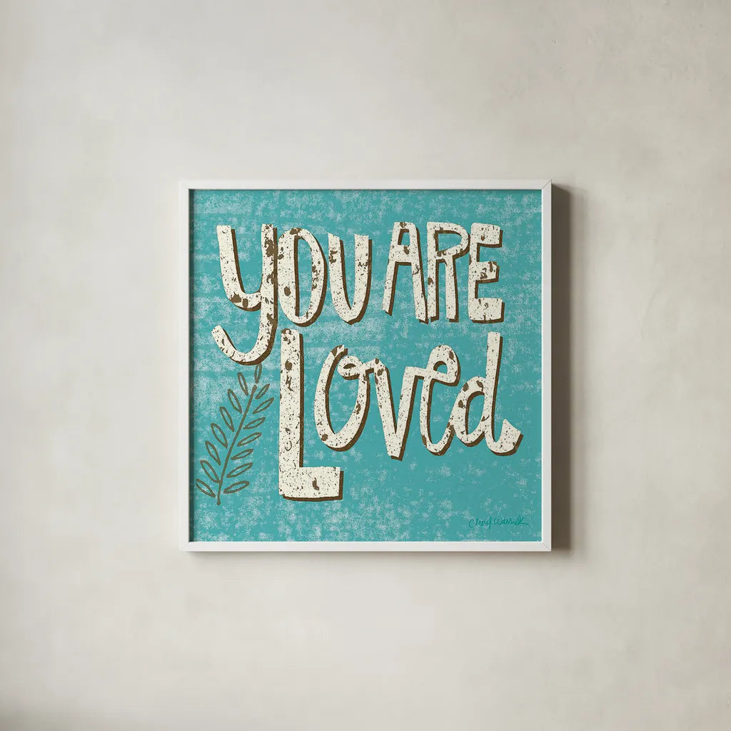 You are Loved by Cheryl Warrick. Shown in a crisp white glass frame for a clean and minimalist style. Available as an archival giclee rolled canvas, fine art paper, or poster print. SKU 18516a.