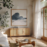 Abstracted Coastal I by Chris Paschke. Shown in a natural wood frame in a cozy modern living room. Available as an archival giclee rolled canvas, fine art paper, or poster print. SKU 83773a.