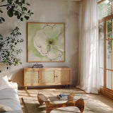 After Dogwood IV by Chris Paschke. Shown in a natural wood frame in a cozy modern living room. Available as an archival giclee rolled canvas, fine art paper, or poster print. SKU 10985a.
