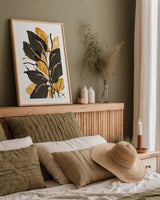 Amber Black and Gold II by Chris Paschke. shown as a paper print in a natural frame. Available as a archival giclee rolled canvas, fine art paper, or poster print. SKU 76323h.