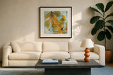 Amber Blue I by Chris Paschke. Displayed in a glass frame with matte in a clean modern living room. Available as an archival giclee rolled canvas, fine art paper, or poster print. SKU 59992a.