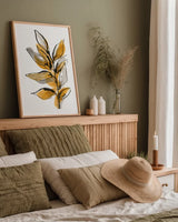 Amber Leaves II by Chris Paschke. shown as a paper print in a natural frame. Available as a archival giclee rolled canvas, fine art paper, or poster print. SKU 75154h.