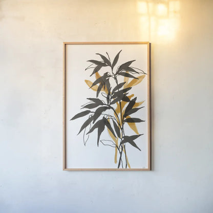 Amber Long Leaf II by Chris Paschke. shown as a paper print in a natural frame. Available as a archival giclee rolled canvas, fine art paper, or poster print. SKU 76329h.