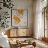 Amber Wash IV by Chris Paschke. Shown in a natural wood frame in a cozy modern living room. Available as an archival giclee rolled canvas, fine art paper, or poster print. SKU 71910a.