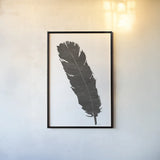 Black Feather V by Chris Paschke. shown as a paper print in a black flame. Available as a archival giclee rolled canvas, fine art paper, or poster print. SKU 28001h.