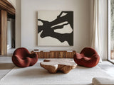 Black Gesture II by Chris Paschke. Shown as extra-large giant wall art in a modern living room. Available as an archival giclee rolled canvas, fine art paper, or poster print. SKU 69345a.