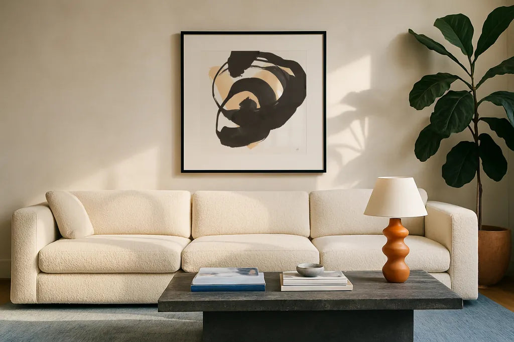 Black and Cream II by Chris Paschke. Displayed in a glass frame with matte in a clean modern living room. Available as an archival giclee rolled canvas, fine art paper, or poster print. SKU 83768a.