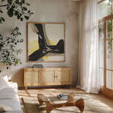 Black and Yellow III by Chris Paschke. Shown in a natural wood frame in a cozy modern living room. Available as an archival giclee rolled canvas, fine art paper, or poster print. SKU 32535a.