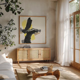 Black and Yellow IV by Chris Paschke. Shown in a natural wood frame in a cozy modern living room. Available as an archival giclee rolled canvas, fine art paper, or poster print. SKU 32536a.