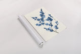 Blue Branch II by Chris Paschke. shown as a rolled paper print. Available as archival giclee rolled canvas, fine art paper, or poster print. SKU 55060h.