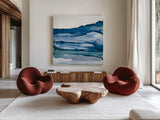 Blue Grayscape III by Chris Paschke. Shown as extra-large giant wall art in a modern living room. Available as an archival giclee rolled canvas, fine art paper, or poster print. SKU 68785a.