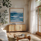 Blue Grayscape IV by Chris Paschke. Shown in a natural wood frame in a cozy modern living room. Available as an archival giclee rolled canvas, fine art paper, or poster print. SKU 68786a.