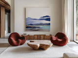 Bluescape I by Chris Paschke. Shown as extra-large giant wall art in a modern living room. Available as an archival giclee rolled canvas, fine art paper, or poster print. SKU 66745a.