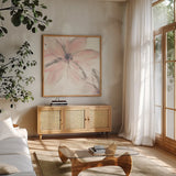 Blush Clematis II by Chris Paschke. Shown in a natural wood frame in a cozy modern living room. Available as an archival giclee rolled canvas, fine art paper, or poster print. SKU 33993a.