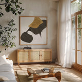 Bold Gold I by Chris Paschke. Shown in a natural wood frame in a cozy modern living room. Available as an archival giclee rolled canvas, fine art paper, or poster print. SKU 86811a.