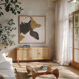 Bold Gold IV by Chris Paschke. Shown in a natural wood frame in a cozy modern living room. Available as an archival giclee rolled canvas, fine art paper, or poster print. SKU 86814a.
