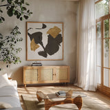 Bold Gold VII by Chris Paschke. Shown in a natural wood frame in a cozy modern living room. Available as an archival giclee rolled canvas, fine art paper, or poster print. SKU 86817a.