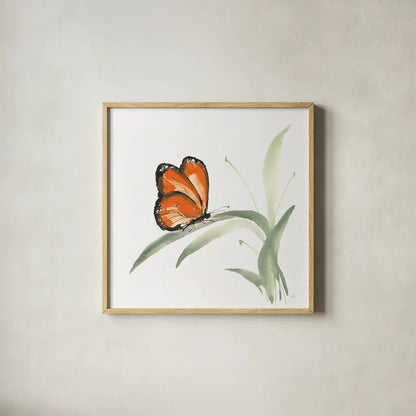 Butterfly Orange II by Chris Paschke. Shown in a natural wood glass frame for a timeless modern aesthetic. Available as an archival giclee rolled canvas, fine art paper, or poster print. SKU 100069a.
