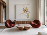 Butterfly Yellow II by Chris Paschke. Shown as extra-large giant wall art in a modern living room. Available as an archival giclee rolled canvas, fine art paper, or poster print. SKU 100071a.
