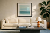 Coastal Abstraction I by Chris Paschke. Displayed in a glass frame with matte in a clean modern living room. Available as an archival giclee rolled canvas, fine art paper, or poster print. SKU 65464a.