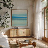 Coastal Abstraction IV by Chris Paschke. Shown in a natural wood frame in a cozy modern living room. Available as an archival giclee rolled canvas, fine art paper, or poster print. SKU 65471a.