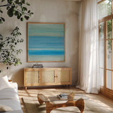 Coastal Abstraction V by Chris Paschke. Shown in a natural wood frame in a cozy modern living room. Available as an archival giclee rolled canvas, fine art paper, or poster print. SKU 65472a.