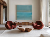 Coastal Abstraction VI by Chris Paschke. Shown as extra-large giant wall art in a modern living room. Available as an archival giclee rolled canvas, fine art paper, or poster print. SKU 65473a.