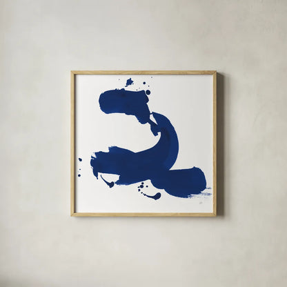 Cobalt Ink Drops II by Chris Paschke. Shown in a natural wood glass frame for a timeless modern aesthetic. Available as an archival giclee rolled canvas, fine art paper, or poster print. SKU 67369a.