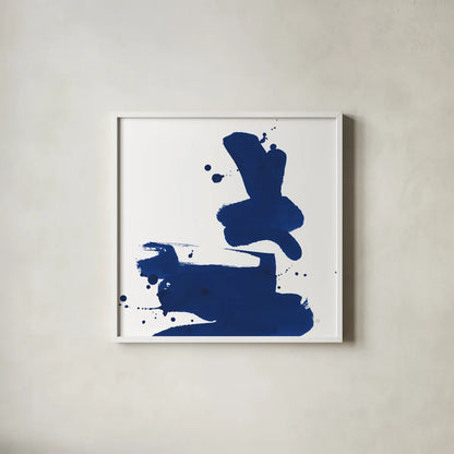 Cobalt Ink Drops III by Chris Paschke. Shown in a crisp white glass frame for a clean and minimalist style. Available as an archival giclee rolled canvas, fine art paper, or poster print. SKU 67370a.
