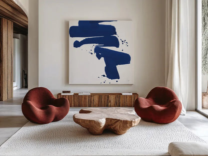 Cobalt Ink Drops IV by Chris Paschke. Shown as extra-large giant wall art in a modern living room. Available as an archival giclee rolled canvas, fine art paper, or poster print. SKU 67371a.