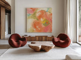 Coral Poppy I by Chris Paschke. Shown as extra-large giant wall art in a modern living room. Available as an archival giclee rolled canvas, fine art paper, or poster print. SKU 50157a.