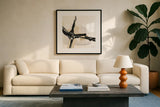 Creamy Tan I by Chris Paschke. Displayed in a glass frame with matte in a clean modern living room. Available as an archival giclee rolled canvas, fine art paper, or poster print. SKU 27926a.