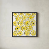 Cut Lemons IV by Chris Paschke. Shown in a sleek black glass frame for a contemporary gallery look. Available as an archival giclee rolled canvas, fine art paper, or poster print. SKU 66887a.