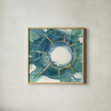 Dharma Wheel I by Chris Paschke. Shown in a natural wood glass frame for a timeless modern aesthetic. Available as an archival giclee rolled canvas, fine art paper, or poster print. SKU 48026a.
