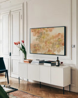 Earthly Freesia by Chris Paschke. shown as a framed stretched canvas in a living room above a console. Available as a archival giclee rolled canvas, fine art paper, or poster print. SKU 50272i.