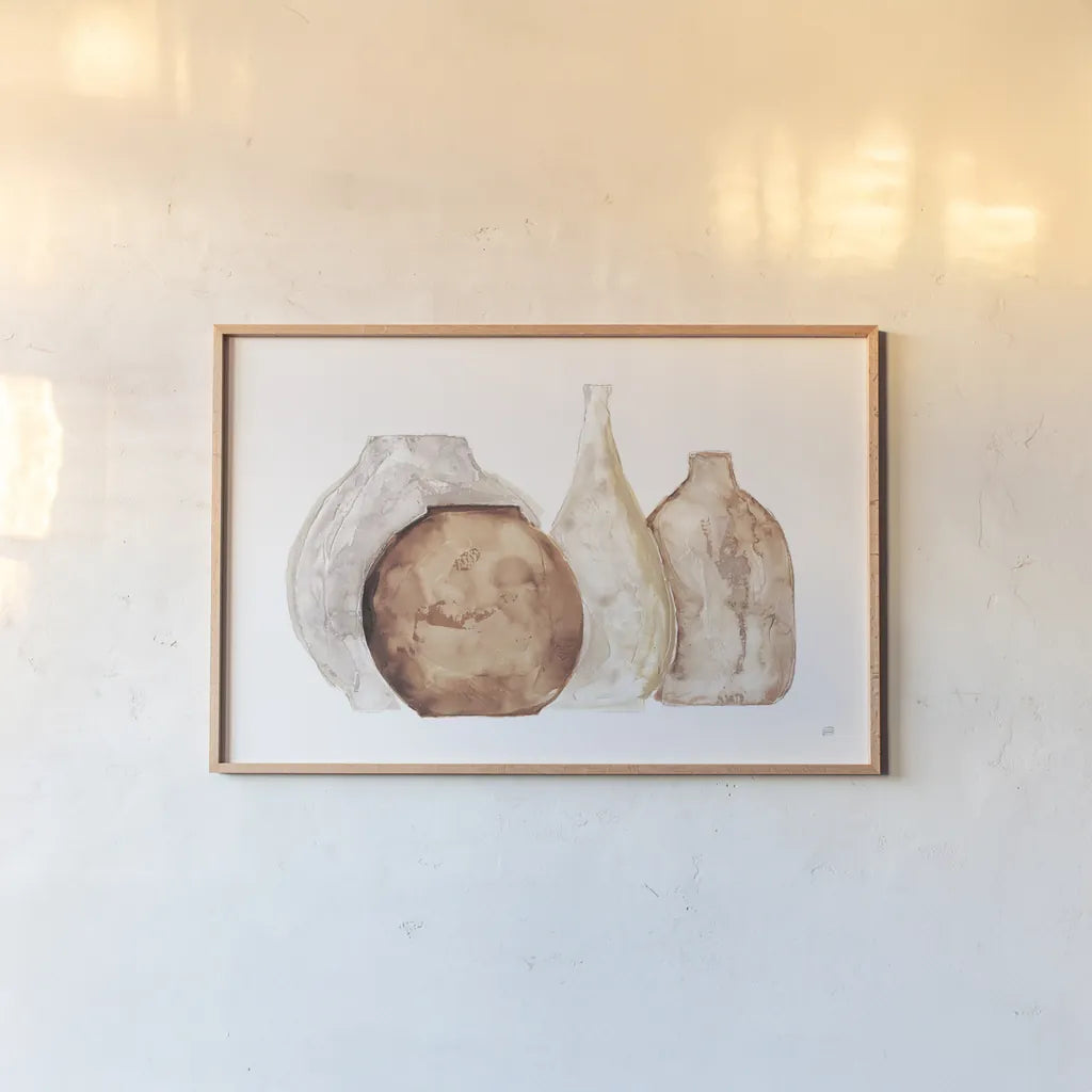 Earthy Neutral Vases IV by Chris Paschke. shown as a paper print in a natural frame. Available as a archival giclee rolled canvas, fine art paper, or poster print. SKU 77194i.